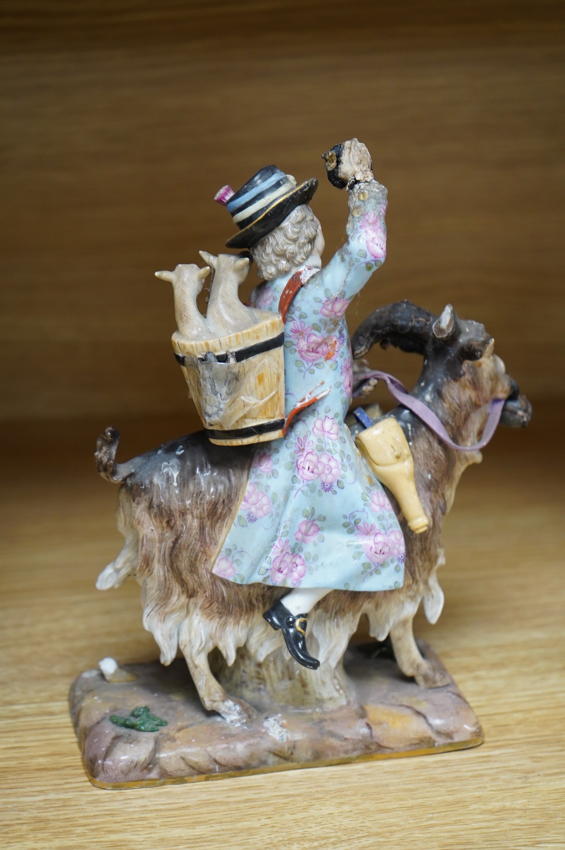 A Meissen figure of Count Bruhl's Tailor, after the model by J J Kändler, incised model number 171, 22cm